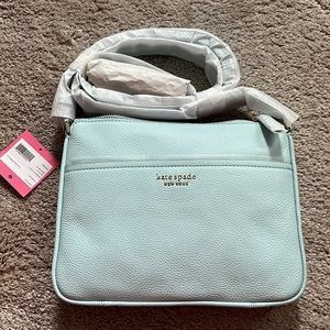 Run around medium crossbody in blue glow